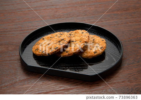 Japanese sweets, sesame rice crackers 73896363
