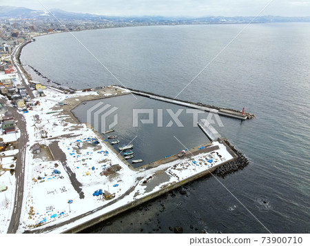 Aerial view of snow scene at Sumiyoshi Fishing Port, Hakodate City, Hokkaido in winter Aerial view of snow scene at Sumiyoshi Fishing Port, Hakodate City, Hokkaido in winter 73900710