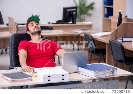 Young male pizza guy in industrial espionage concept Young male pizza guy in industrial espionage concept 73900719