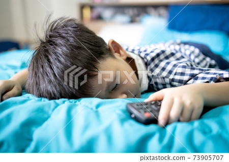 Hands of female driver is spraying alcohol into a compressor before touching,filling air in the tires,disinfection using spray alcohol during the Coronavirus,COVID-19 pandemic,new normal life concept 73905707