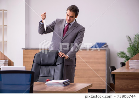 Young businessman employee in bullying concept in the office 73906744