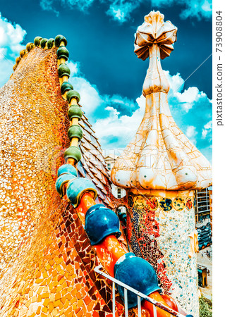 BARCELONA, SPAIN - SEPT  04, 2014: Roof, housetop  Gaudi's  creation-house Casa Batlo. The building that is now Casa Batllo was built in 1877 by Antoni Gaudi, and now commissioned by Lluis Sala 73908804