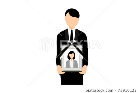 A man standing with his wife's deceased 73910122