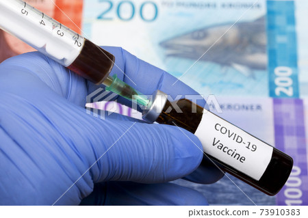 Vaccine against Covid-19 on the background of Norwegian krone Vaccine against Covid-19 on the background of Norwegian krone 73910383
