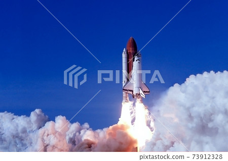 Take off space rocket on a background of blue sky and sun. Elements of this image were furnished by NASA Take off space rocket on a background of blue sky and sun. Elements of this image were furnished by NASA 73912328