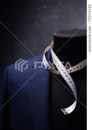 suit jacket on male tailor mannequin 73914156