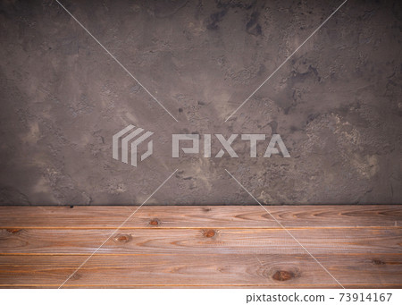 wooden table or tabletop near wall backgroun wooden table or tabletop near wall backgroun 73914167