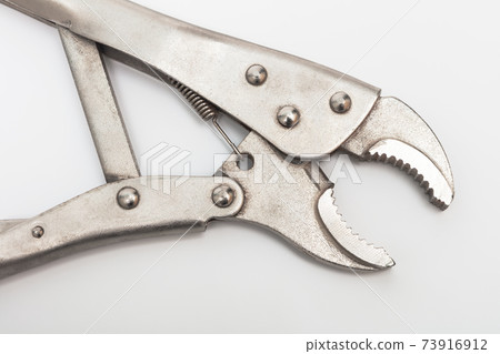 Locking wrench on white background. Locking wrench on white background. 73916912