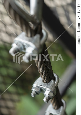 Metal background and cable Metal background and cable 73917818