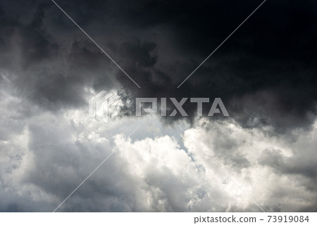 Storm Clouds in a Dark Dramatic Sky - Full frame photography 73919084