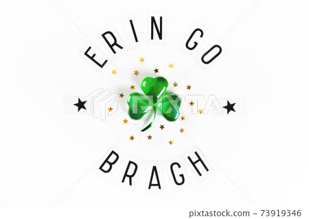 Ireland forever written in irish with shamrock made of green glass hearts  73919346