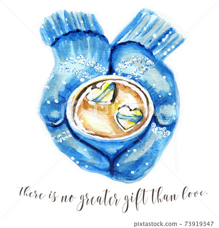 Two hands in mittens hold out a cup of hot chocolate with vanilla hearts 73919347