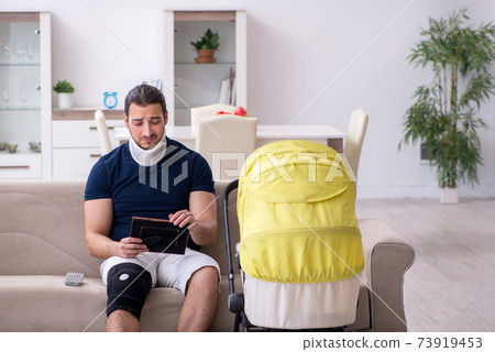 Young injured man looking after newborn in unrequited love Young injured man looking after newborn in unrequited love 73919453