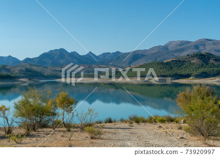 View on a beautiful mountain lake in Andalusia in Spain 73920997