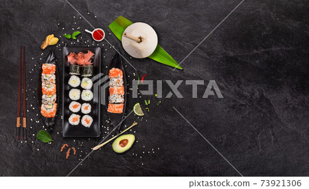Set of sushi and maki roll on stone table. 73921306