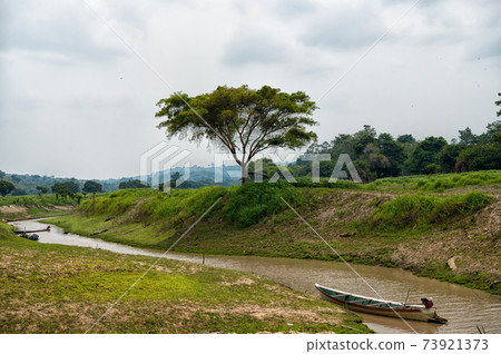 Boat on amazon river in boca de valeria, brazil. Amazon Boat on amazon river in boca de valeria, brazil. Amazon 73921373
