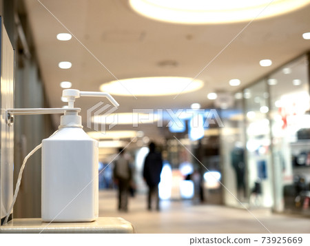 Disinfectant placed at the entrance of the building Disinfectant placed at the entrance of the building 73925669
