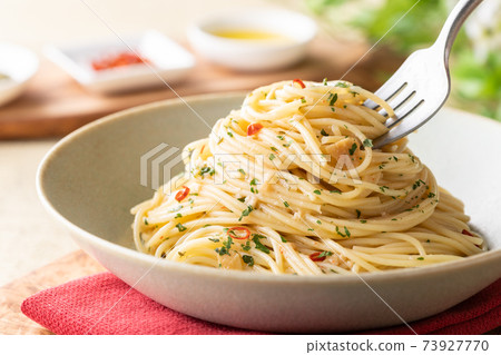 Spaghetti Peperoncino scooped with a fork Spaghetti Peperoncino scooped with a fork 73927770