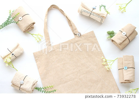Roll the eco bag into small pieces and carry it Roll the eco bag into small pieces and carry it 73932278