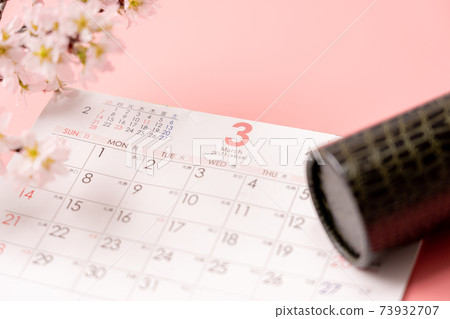 Round tube, calendar and cherry blossoms 73932707