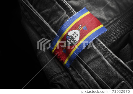 Tag on dark clothing in the form of the flag of the Swaziland Tag on dark clothing in the form of the flag of the Swaziland 73932970