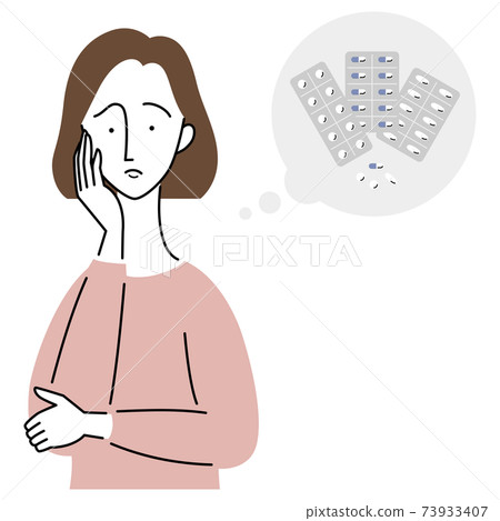 A woman who seems to be worried about medicine 73933407