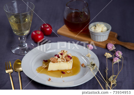 Dessert cheese, white wine and honey 73934953