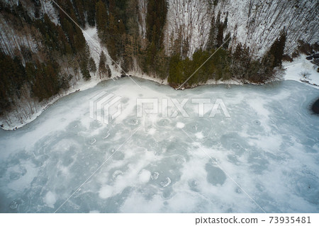 Frozen Lake Nakatsuna, Omachi City, Nagano Prefecture (aerial view by drone) 73935481