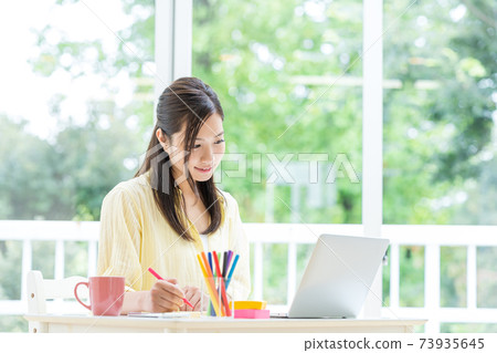 Students taking remote lessons at home Students taking remote lessons at home 73935645