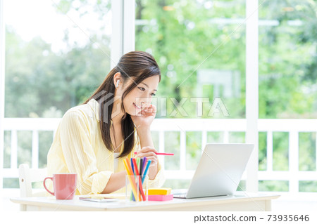 Students taking remote lessons at home Students taking remote lessons at home 73935646