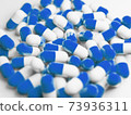 A large number of blue capsules (medicines, supplements) stock photos 73936311