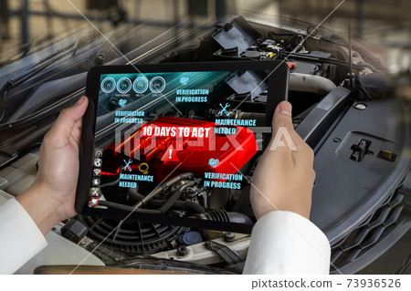 Engineer use augmented reality software to monitor parts of car vehicle Engineer use augmented reality software to monitor parts of car vehicle 73936526