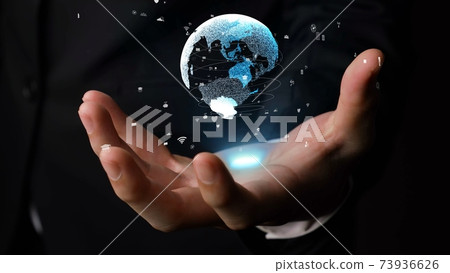 Human hand holding earth globe holographic technology 73936626