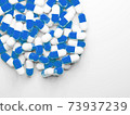 Photo material of a large number of capsules (medicines, supplements) with copy space 73937239