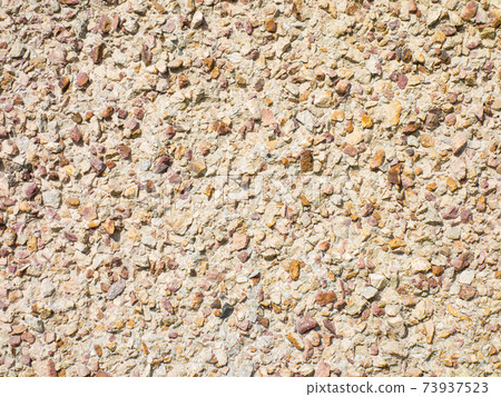 Concrete wall background with stones Concrete wall background with stones 73937523