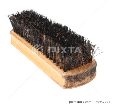 Clothes brush on white background Clothes brush on white background 73937775