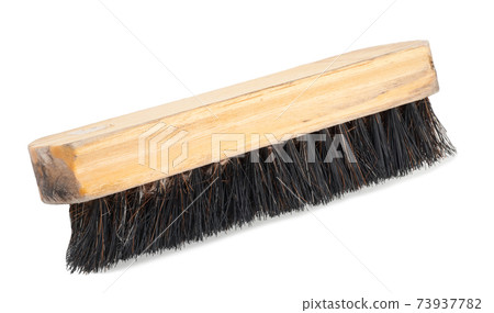 Clothes brush on white background Clothes brush on white background 73937782