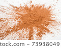Pile cocoa powder on white background 73938049
