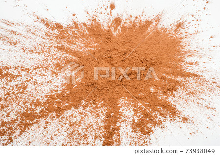Pile cocoa powder on white background 73938049