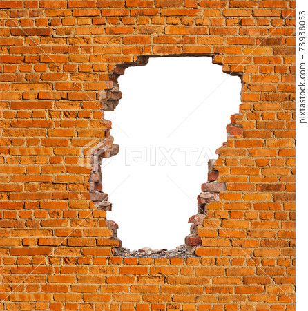 Broken hole in an old brick wall 73938053