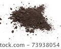 Heap of soil on a white background 73938054