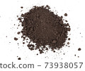 Heap of soil on a white background 73938057