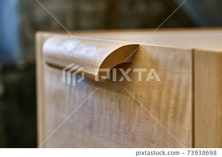 Joinery. Solid wood nightstand building process. Wooden furniture manufacturing process. Furniture manufacture. Close-up 73938698