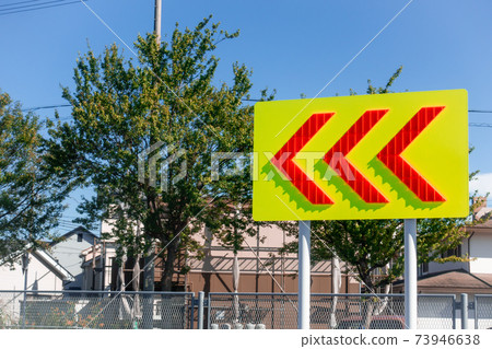 Photograph of a sign indicating the direction of travel taken in Japan Photograph of a sign indicating the direction of travel taken in Japan 73946638