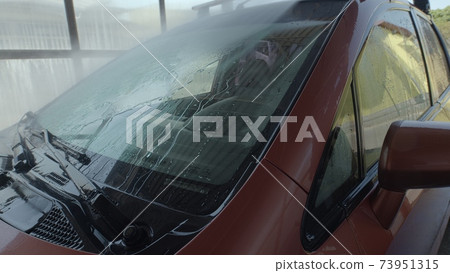 Eashing dirty car closeup footage 73951315