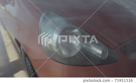 Eashing dirty car closeup footage 73951316