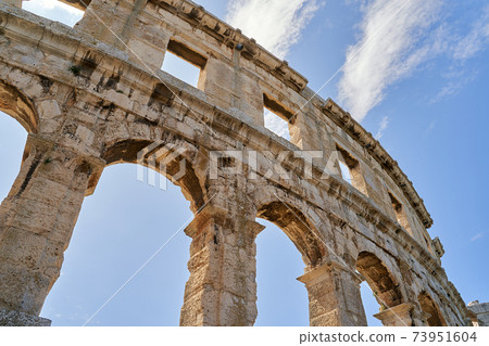 Ancient Roman amphitheater arena ruins in Pula, Croatia. 73951604