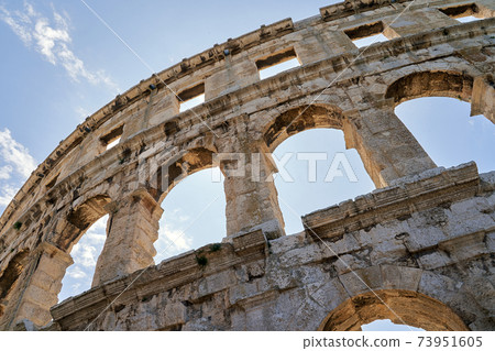 Ancient Roman amphitheater arena ruins in Pula, Croatia. 73951605