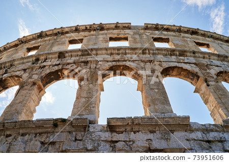 Ancient Roman amphitheater arena ruins in Pula, Croatia. 73951606