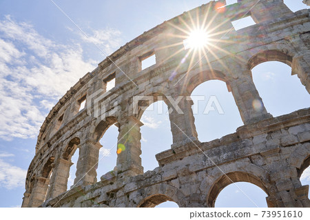 Ancient Roman amphitheater arena ruins in Pula, Croatia. 73951610